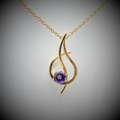 Pendentif en or 18 carat avec une amethyste de 4 mm