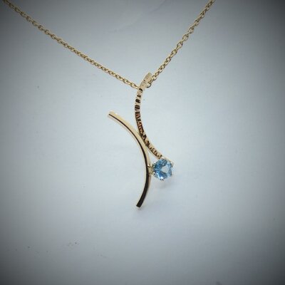 Pendentif or 18 carat, topaz bleu